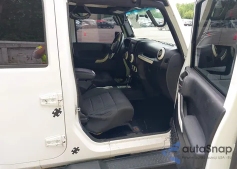 2012 Jeep Wrangler Unlimited Sahara из США, поврежденный, VIN 1C4BJWEG5CL180898